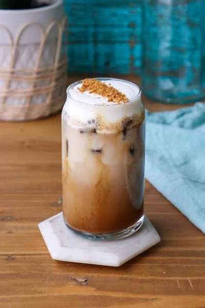 Creamy Biscoff Latte with Lotus Biscoff flavor at Almers Cafe