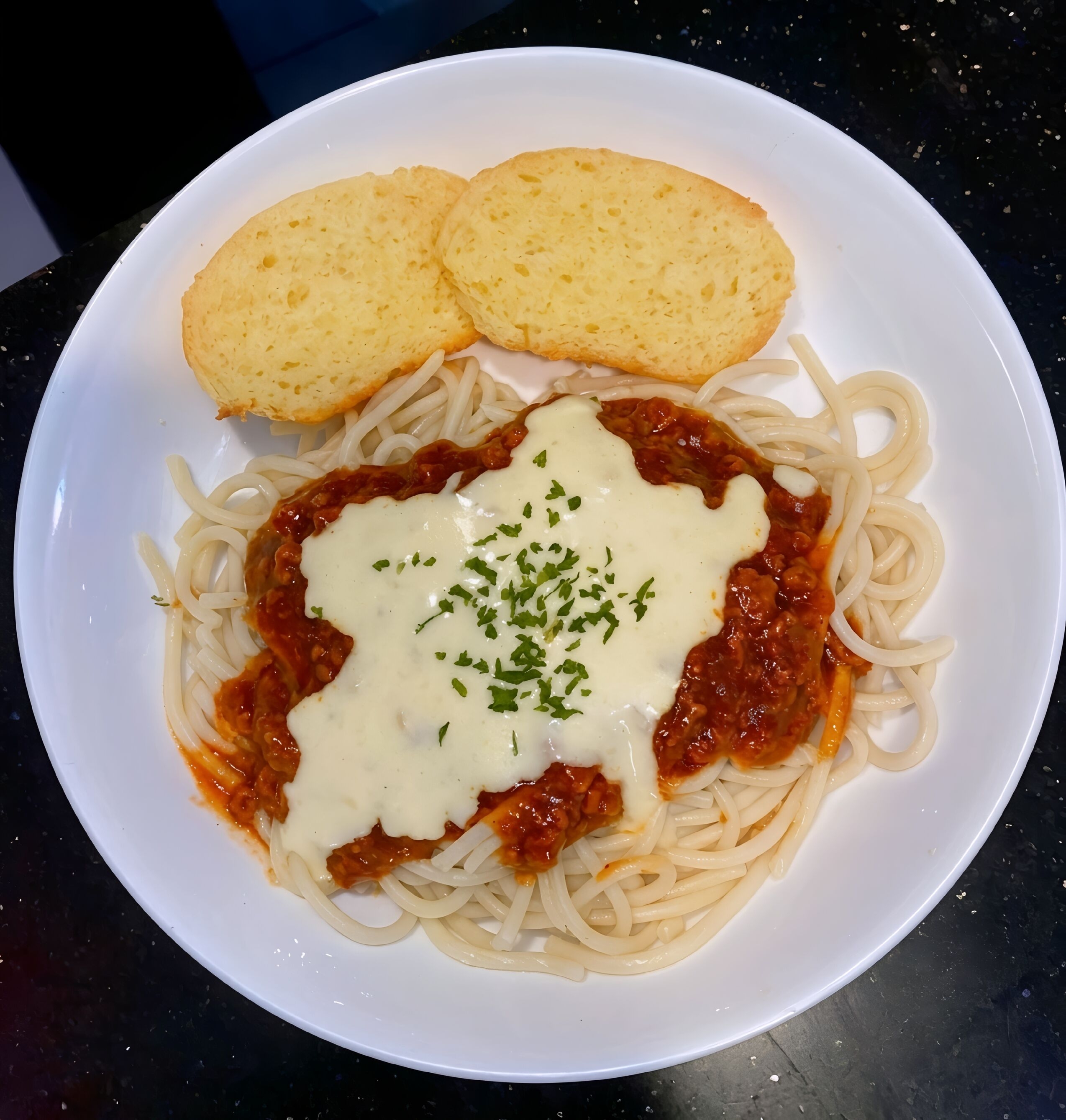 Rich and savory Bolognese pasta at Almers Cafe